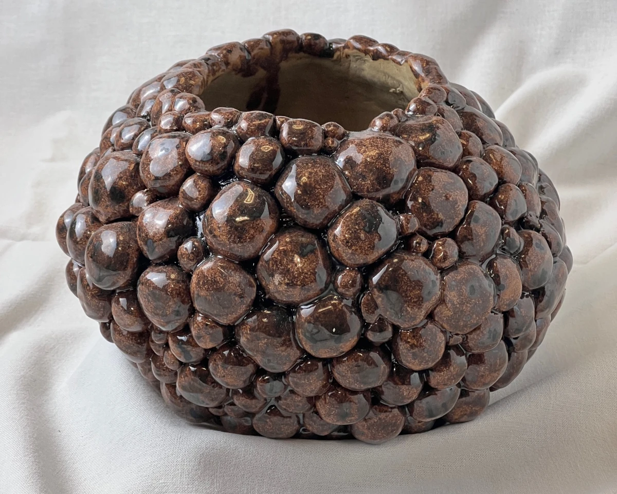 Decorative ceramic planter cover