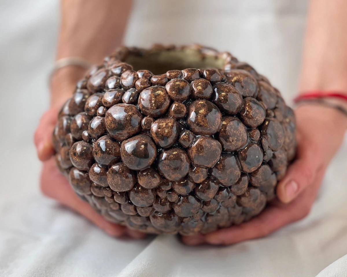 Decorative ceramic planter cover